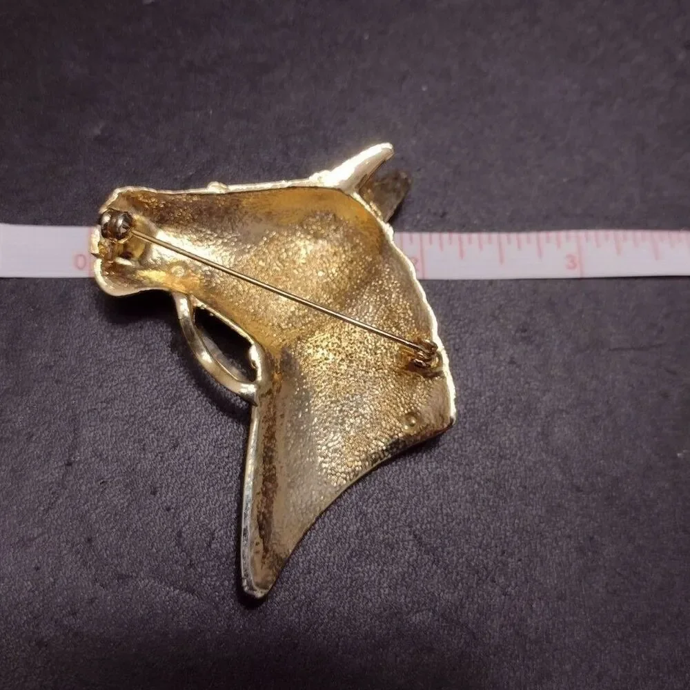 Gold tone horse head brooch